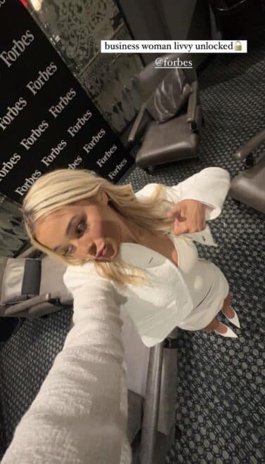 Olivia selfie, dressed in white | IG story September 2023