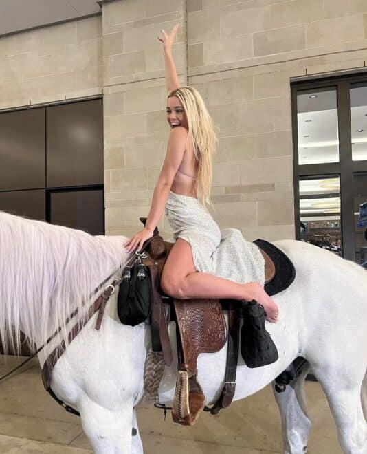 Olivia riding a horse in Texas via IG [May 2023)